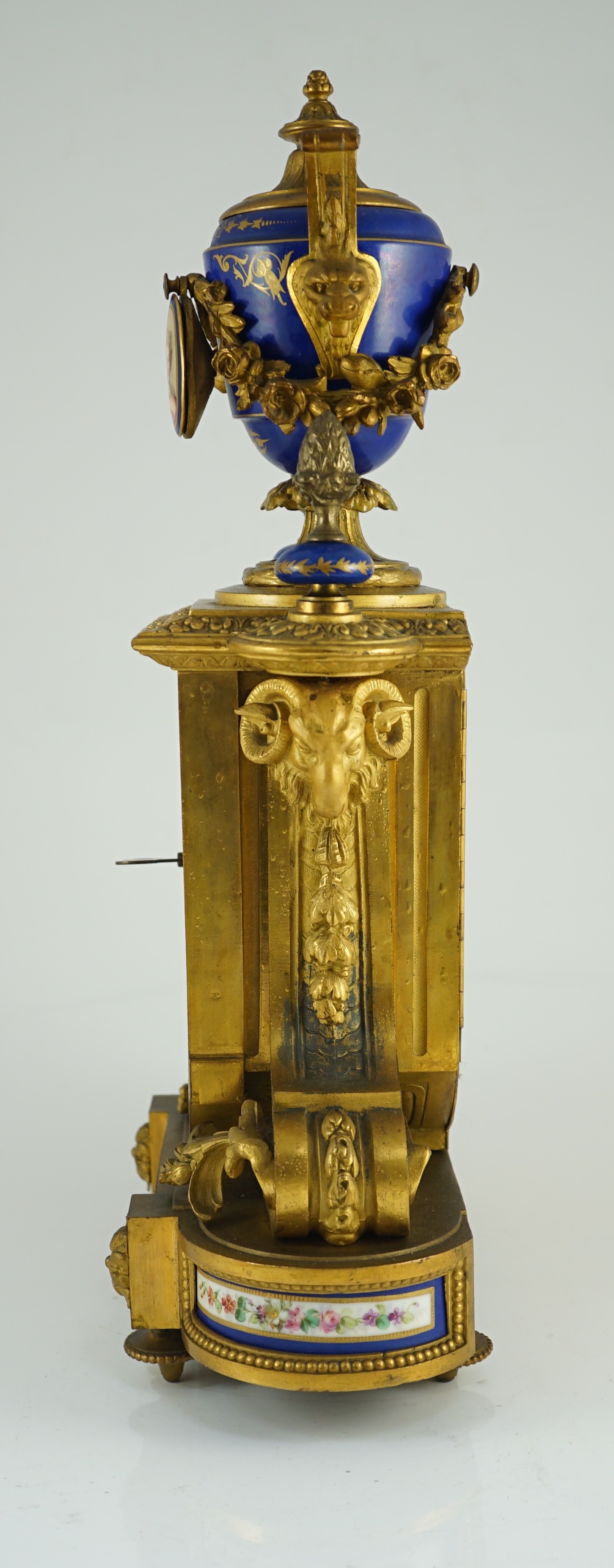 A 19th century French ormolu and Sevres style porcelain mantel clock, 29cm wide, 50cm high